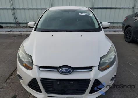 2014 Ford Focus Titanium from USA, damaged, VIN 1FADP3J25EL138367